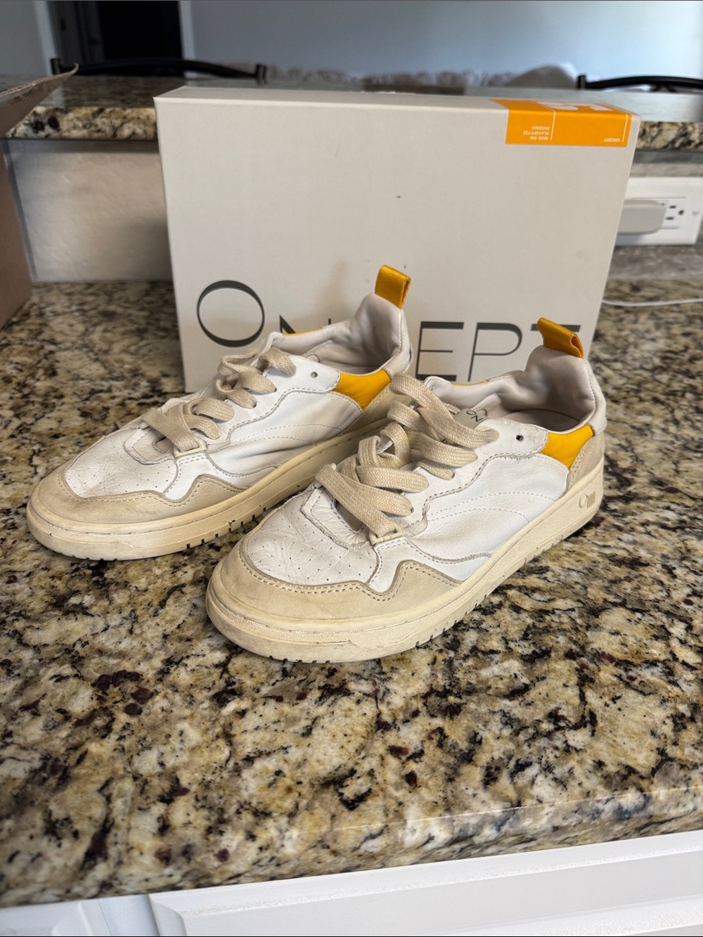 On Running Women’s White Sneakers with Yellow Accents
